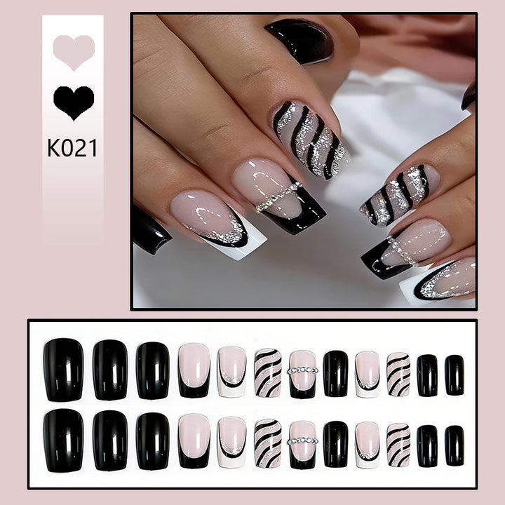Artificial nail set with glamorous glitter and stripe designs Bowlift