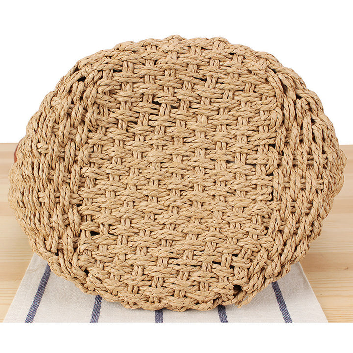 Shoulder bag made of hand-woven natural material with stylish leather accents Bowlift