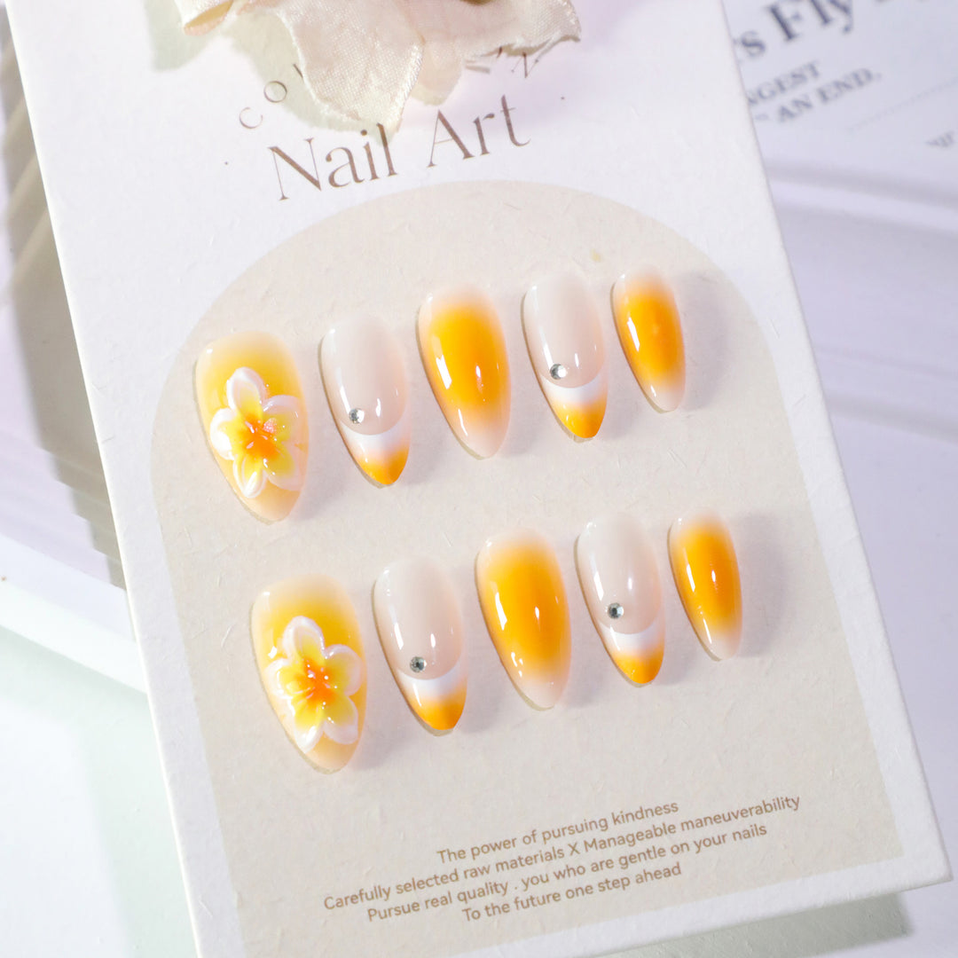 Artful nail extensions with delicate ombre effect and floral accents Bowlift