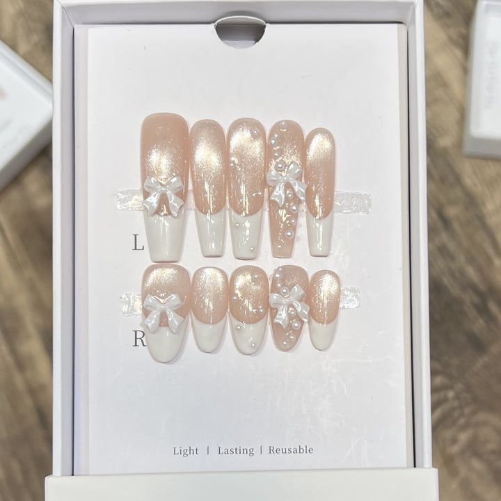 Decorative Long Press-On Nail Set with Bow and Pearl Accents Bowlift