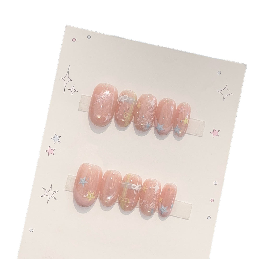 Artificial nails with romantic star and glitter motifs Bowlift