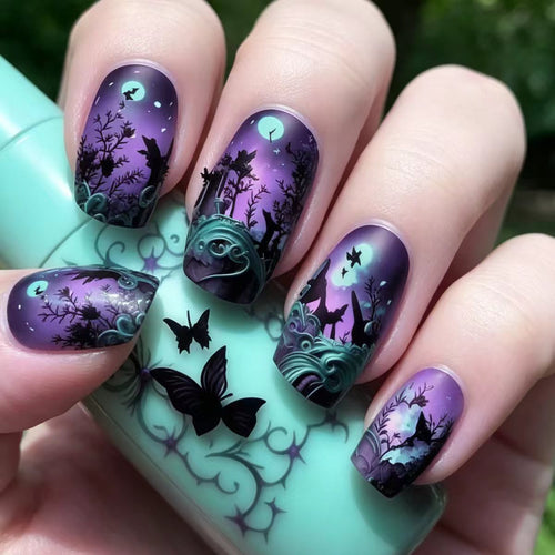 Nail art design with butterfly and night motif Bowlift