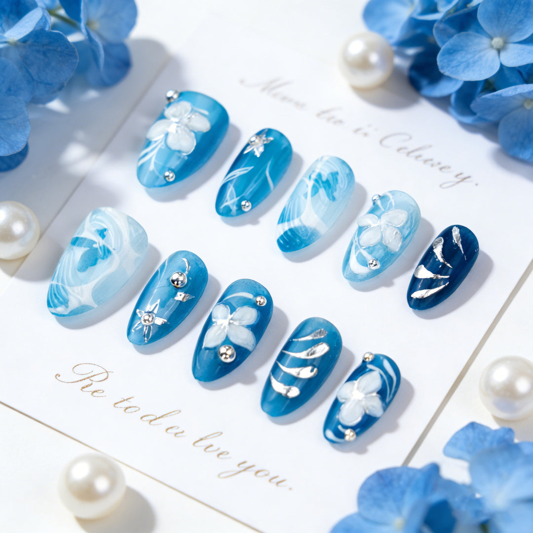 Artificial nail set with floral accents and elegant glitter elements Bowlift