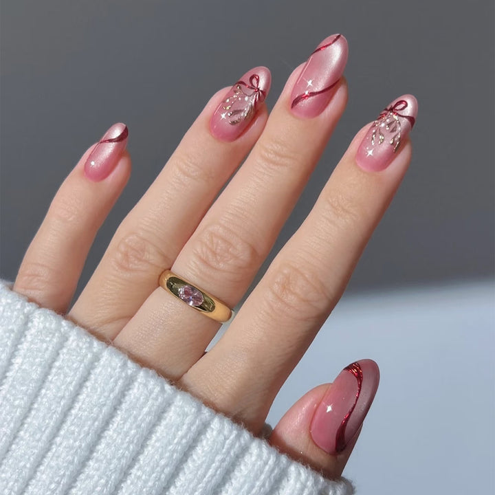 Nail art set with intricate bow and glitter decorations Bowlift