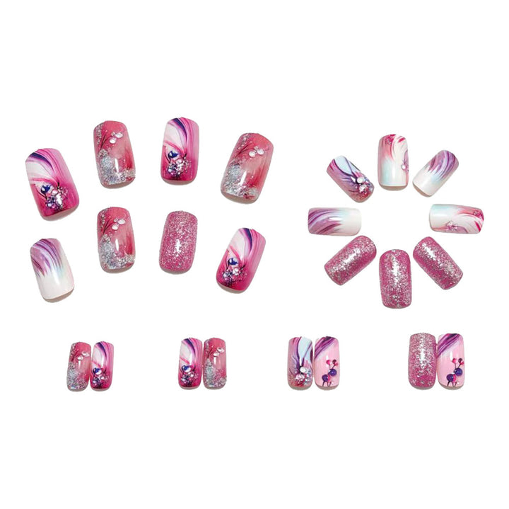 Glamorous artificial nails with delicate flower design and glitter accents Bowlift