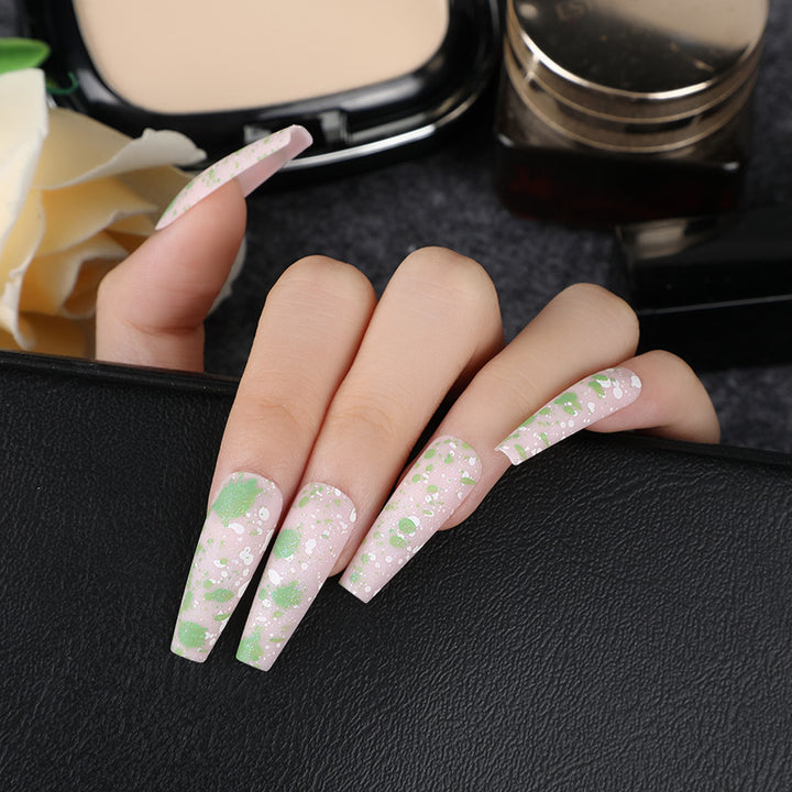 Artistic splatter design artificial nails Bowlift