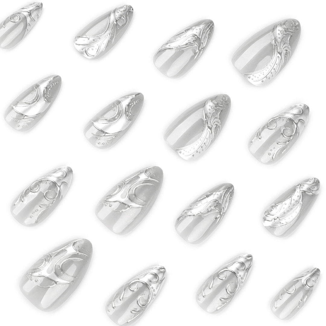 Artistic stiletto nails with elegant silver design Bowlift