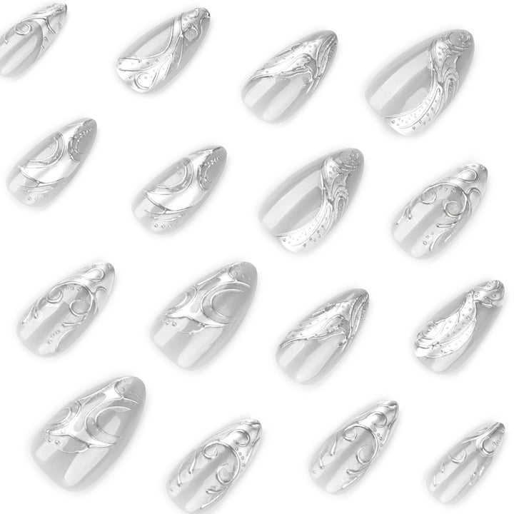Artistic stiletto nails with elegant silver design Bowlift
