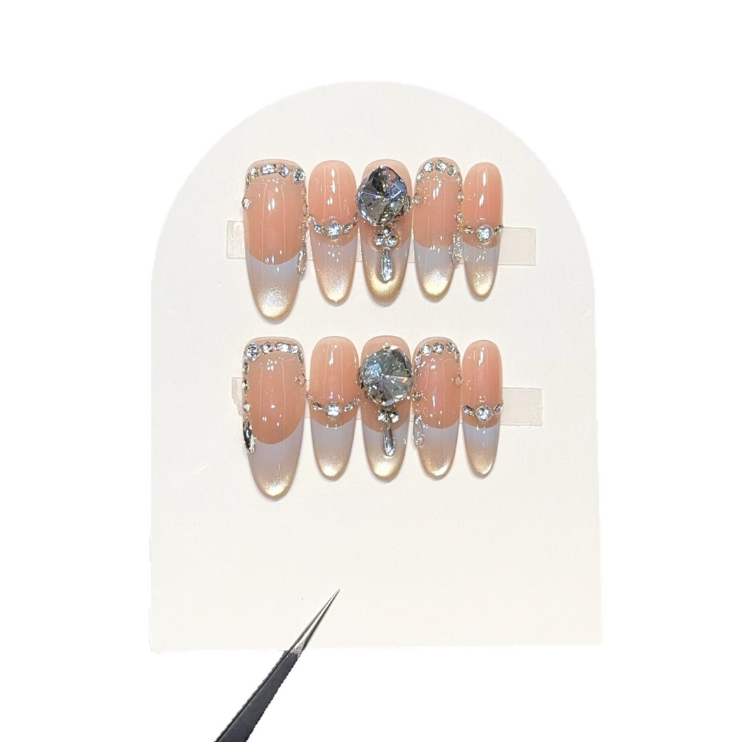 Artificial nails with elegant rhinestone accents Bowlift