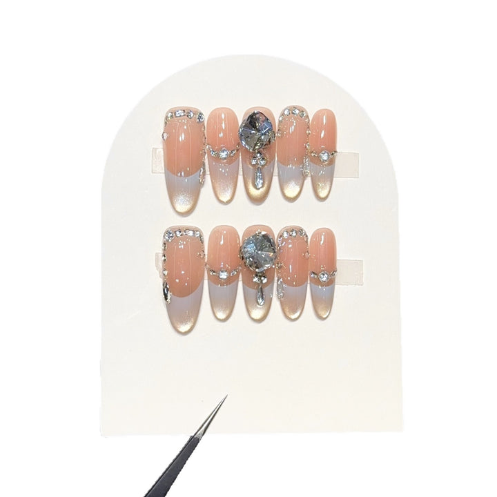 Artificial nails with elegant rhinestone accents Bowlift