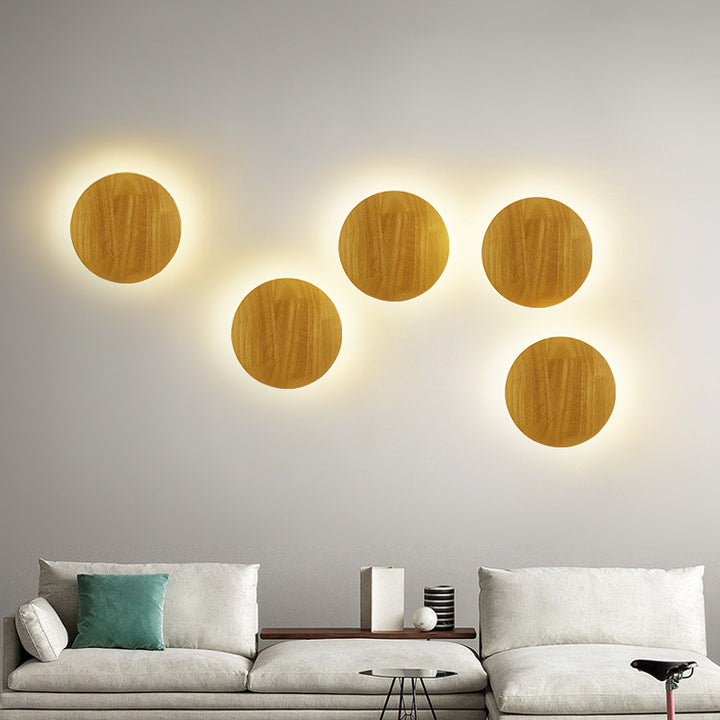 Organic pebble-shaped LED wall sconce solid wood face warm ambient backlight Bowlift
