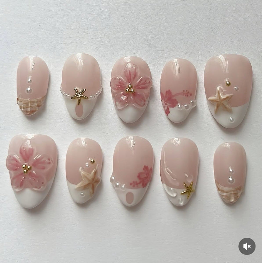 Artificial nail set with floral and maritime designs Bowlift