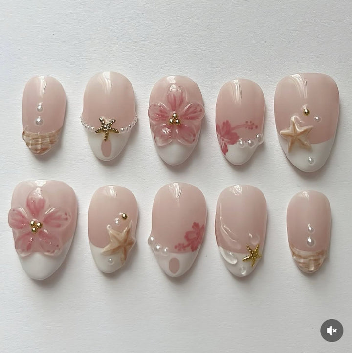 Artificial nail set with floral and maritime designs Bowlift