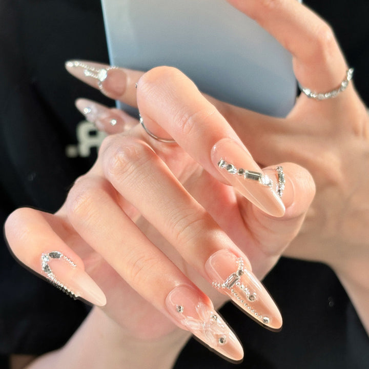 Elegant artificial nails with noble rhinestone embellishments Bowlift