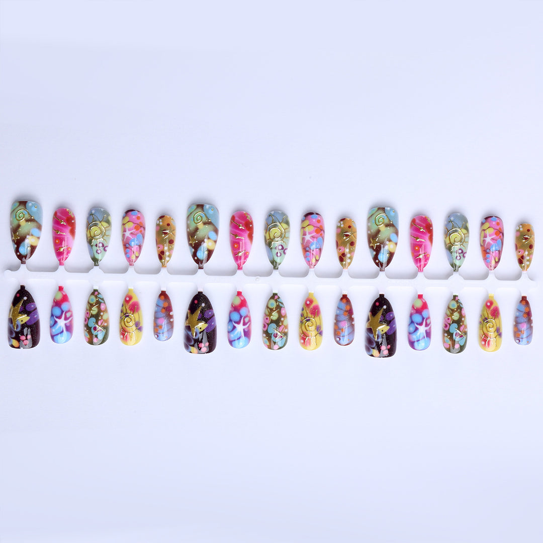 Artificial nails with handcrafted designs Bowlift
