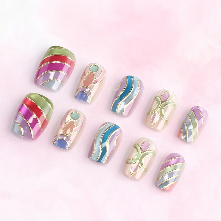 Artistic Press-On Nail Set with Gold Accents Bowlift