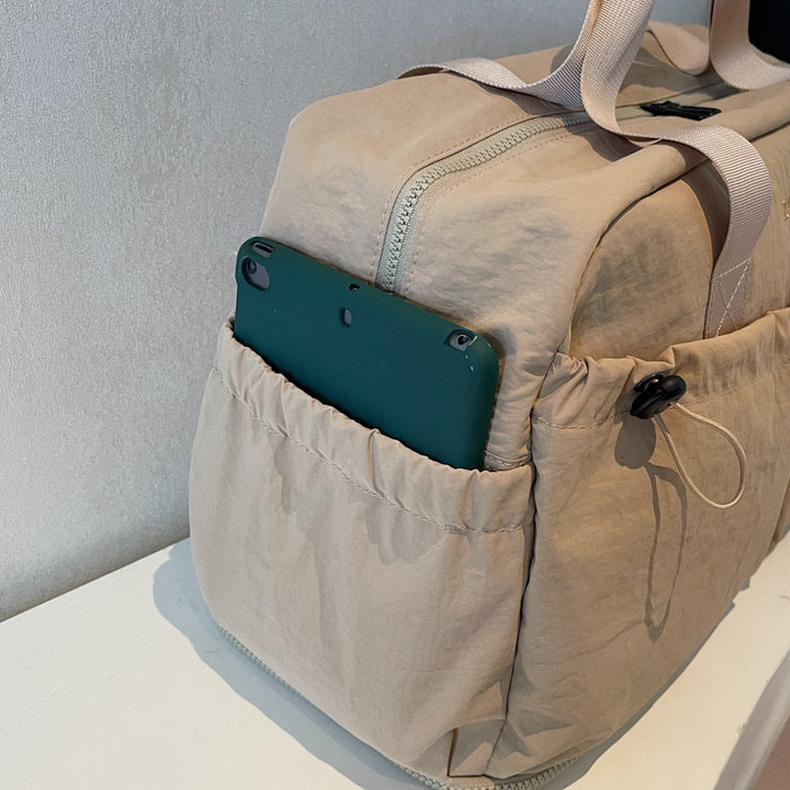 Travel bag with multifunctional compartments Bowlift
