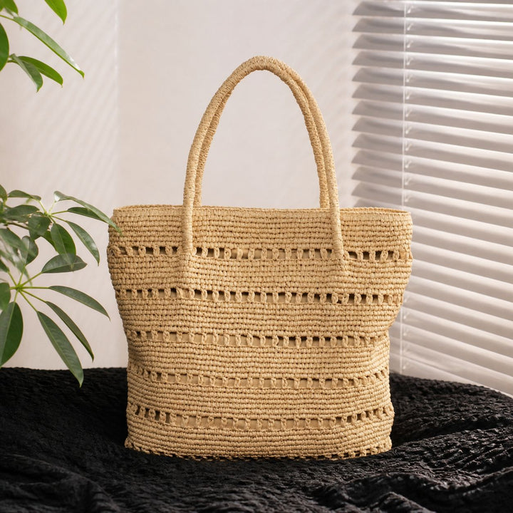 Handcrafted beach bag with open woven pattern Bowlift
