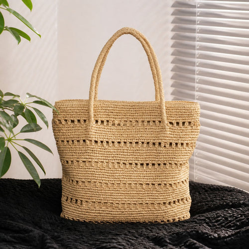 Handcrafted beach bag with open woven pattern Bowlift