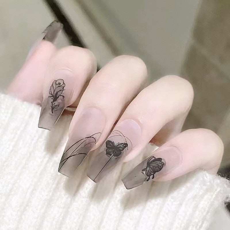 Artificial nail set with elegant flower design and delicate butterfly motifs Bowlift