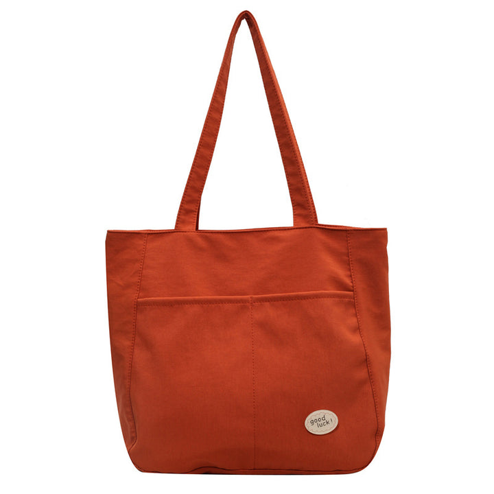 Multi-Pocket Utility Tote Bowlift