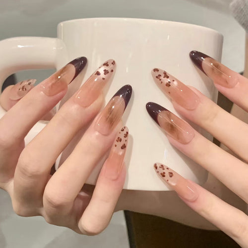 Artistic Stiletto Press-On Nails with Unique Animal Print Accents Bowlift