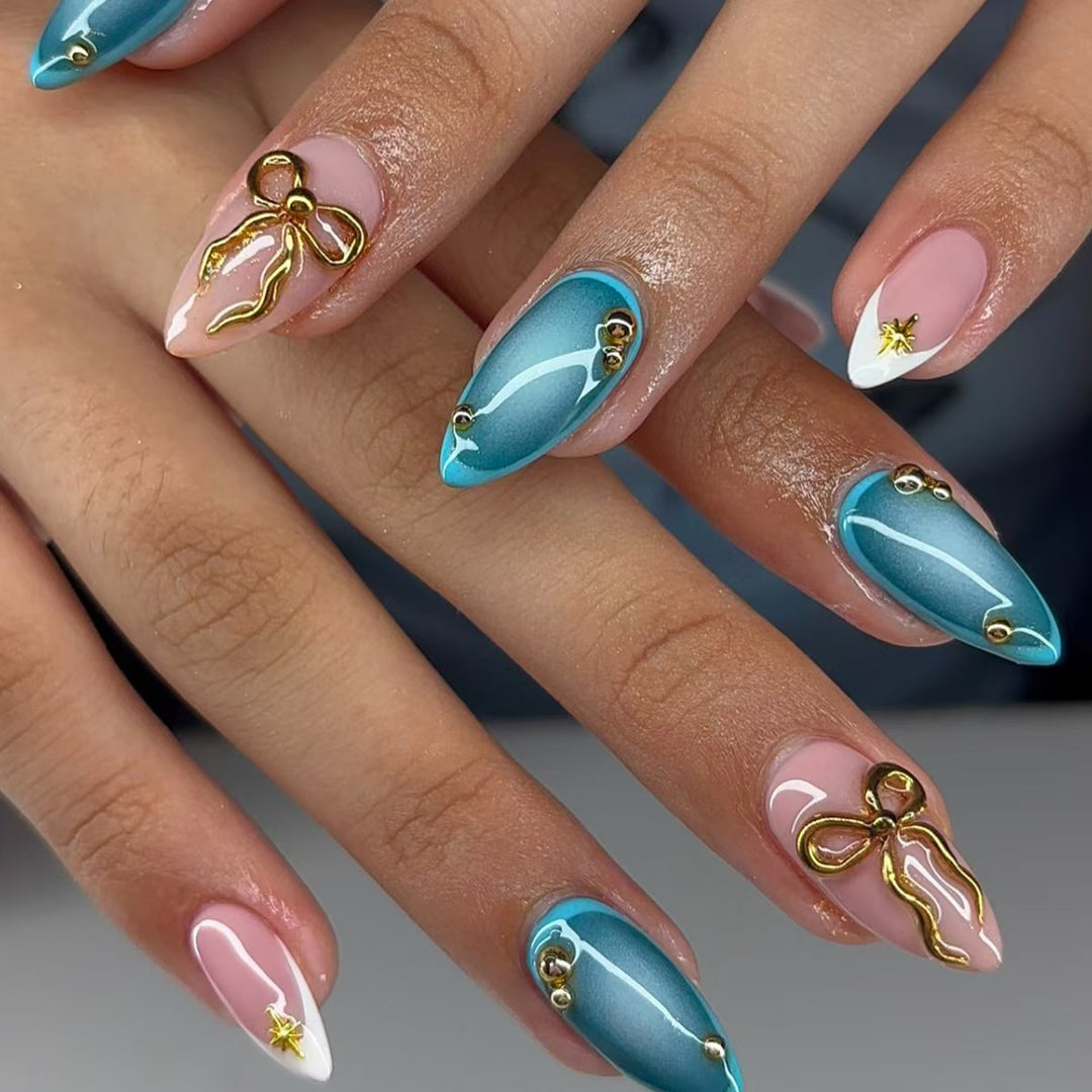 Artistic Stiletto Nail Art Set with Gold Accents Bowlift