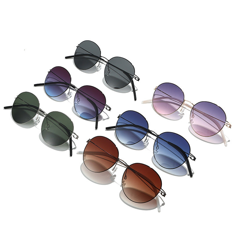 Women round sunglasses with light metal frame and gradient lenses Bowlift