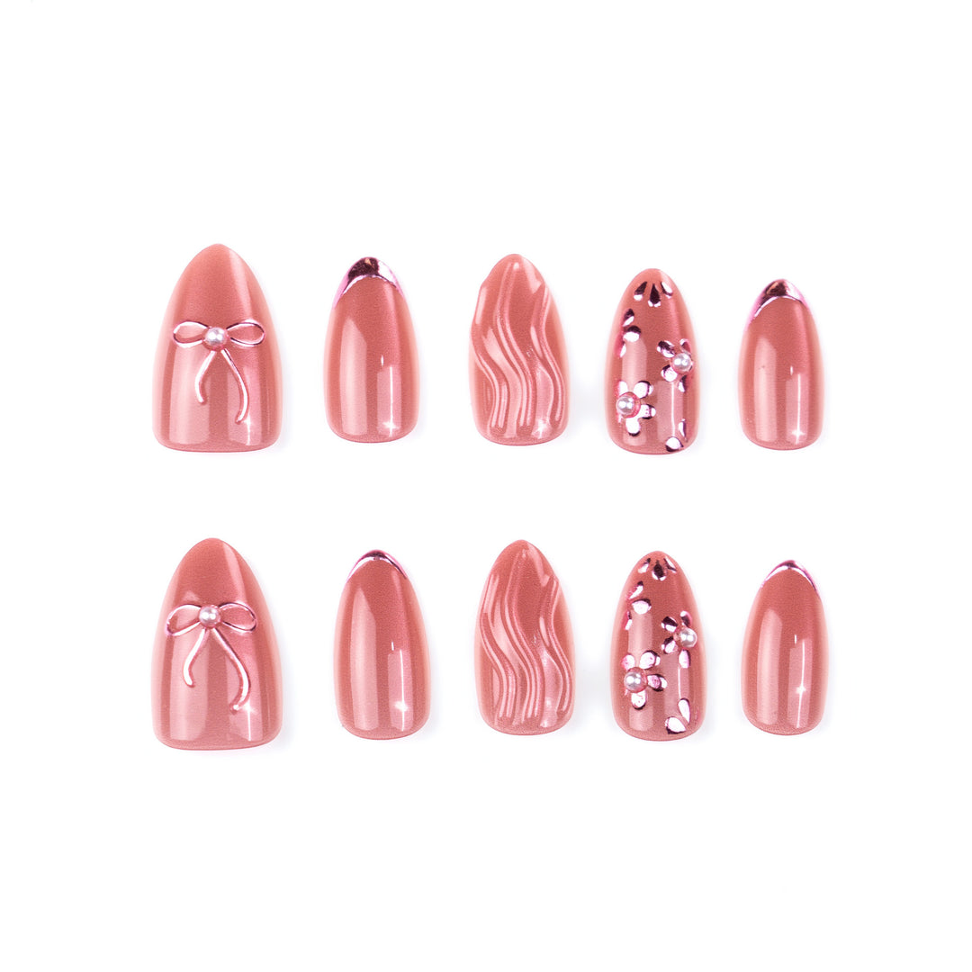 Nail art set with elegant bows and pearl accents Bowlift