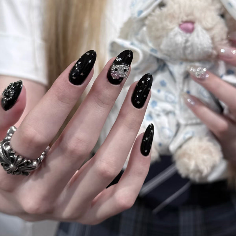 Artistic Press-On Nails with Star and Skull Accents Bowlift