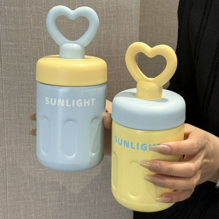 Women's practical drinking bottle with heart handle Bowlift