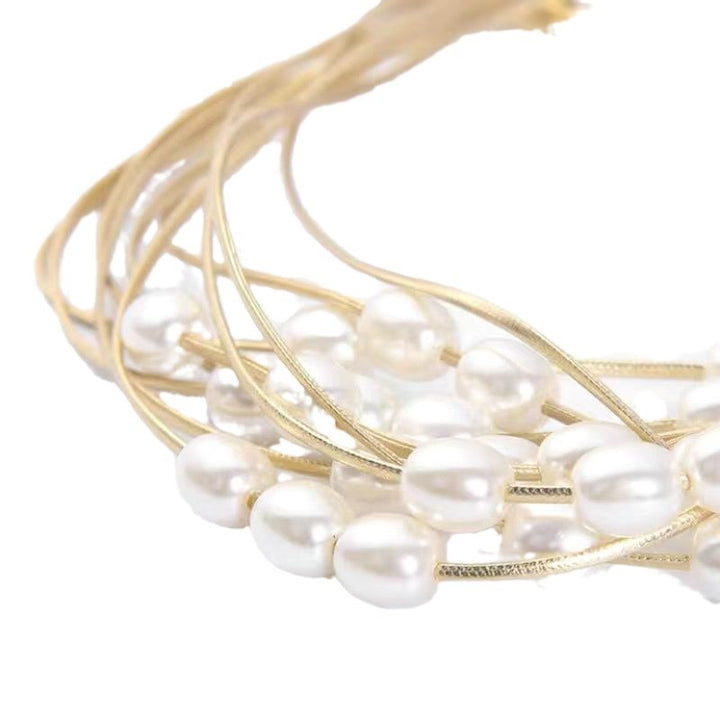Decorative curtain holder with bead accent Bowlift