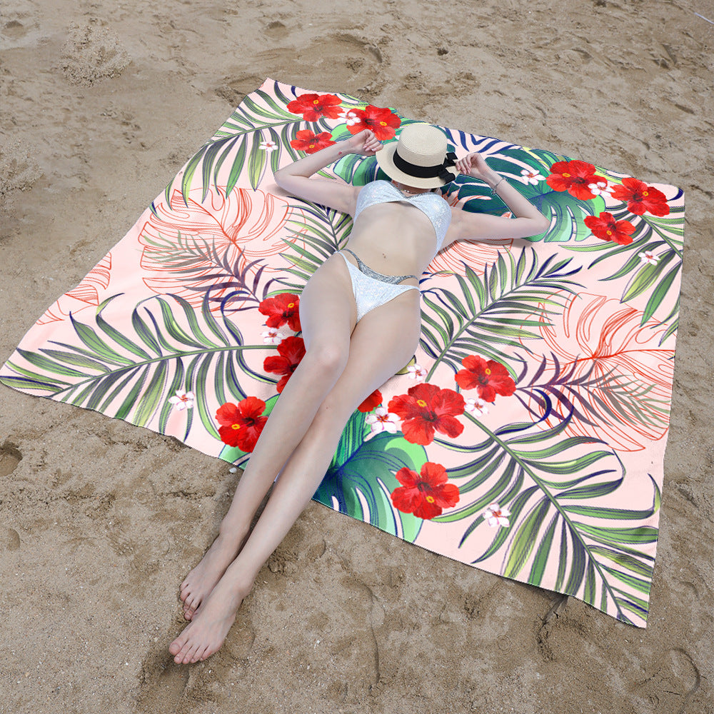 Beach blanket with vibrant floral pattern and innovative structure Bowlift