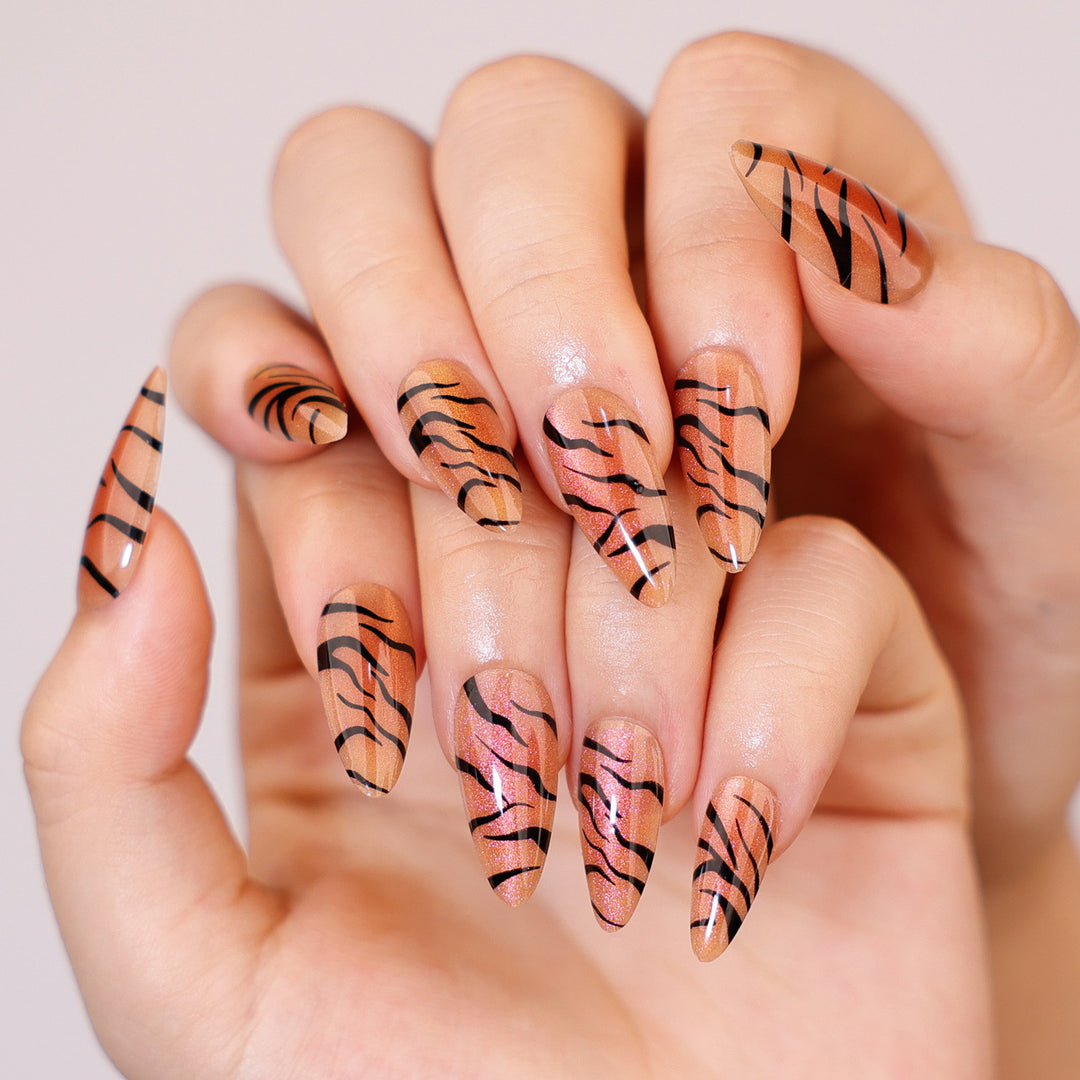 Artful stiletto nails with creative tiger stripe design Bowlift