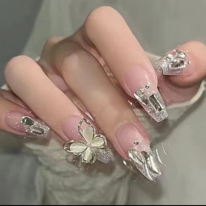 Elegant Nail Art with Glitter and Rhinestones Bowlift