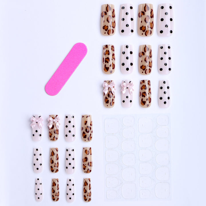 Creative artificial nails with bows and dots Bowlift