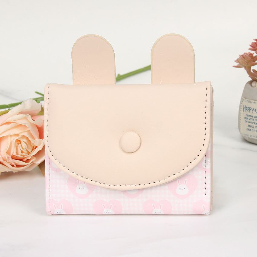 Compact rabbit-themed coin purse with snap closure and card slots Bowlift