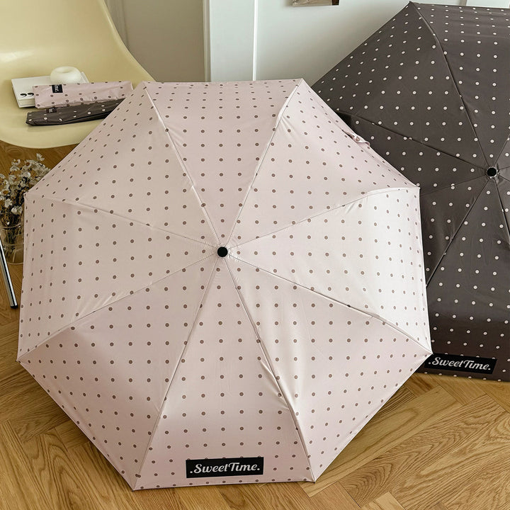 Women Folding Umbrella Bowlift