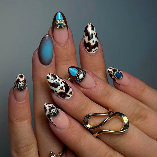Artful Stiletto Fingernails with Unique Accents Bowlift