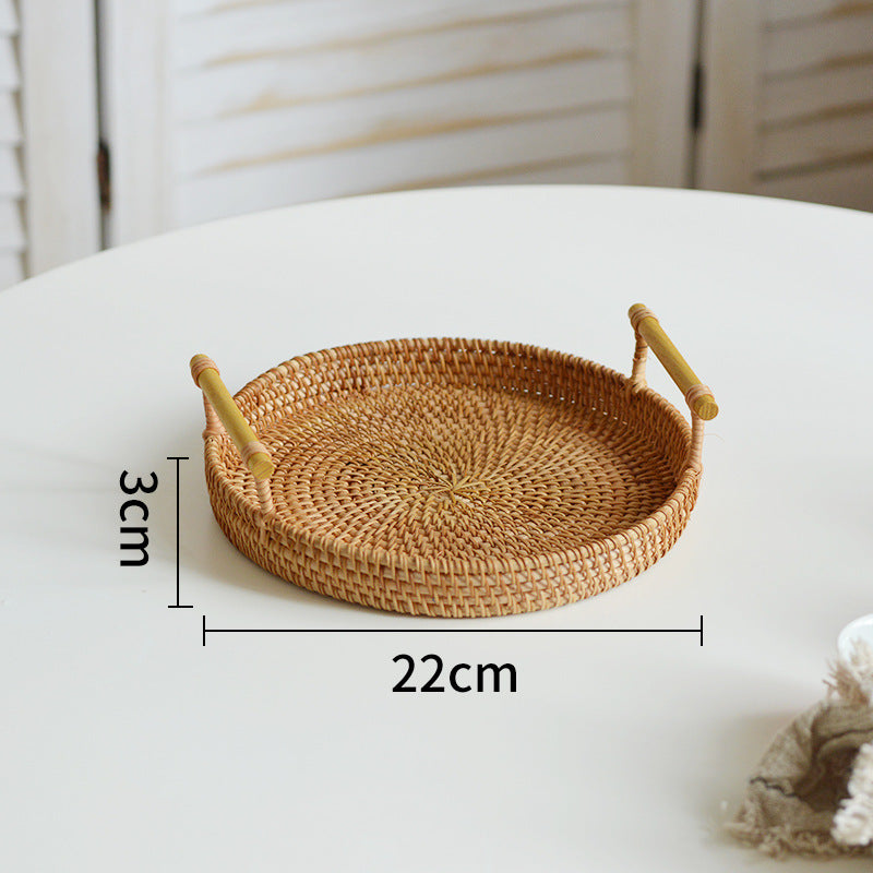 Round serving platter made of braided rattan Bowlift