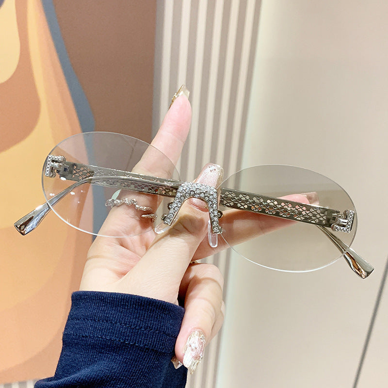 Women's sunglasses with glittering frame and oval lenses Bowlift