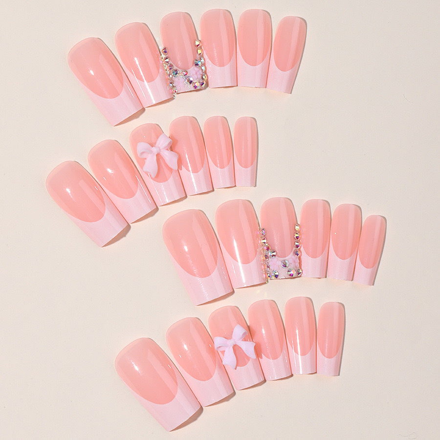 Artifical nail set with glamorous 3D bows and crystal embellishments Bowlift