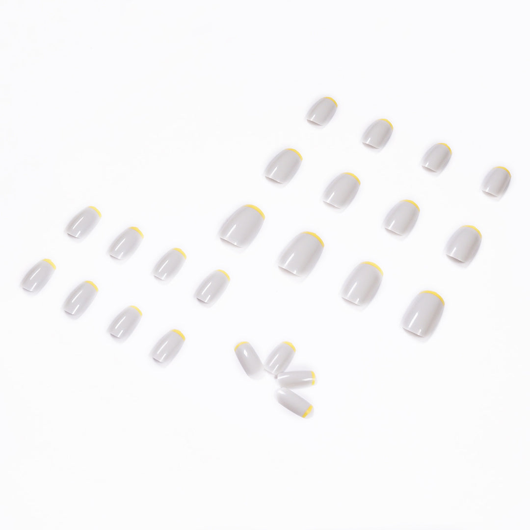 Artistic nail extensions with modern French-tip design Bowlift