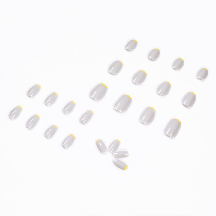 Artistic nail extensions with modern French-tip design Bowlift
