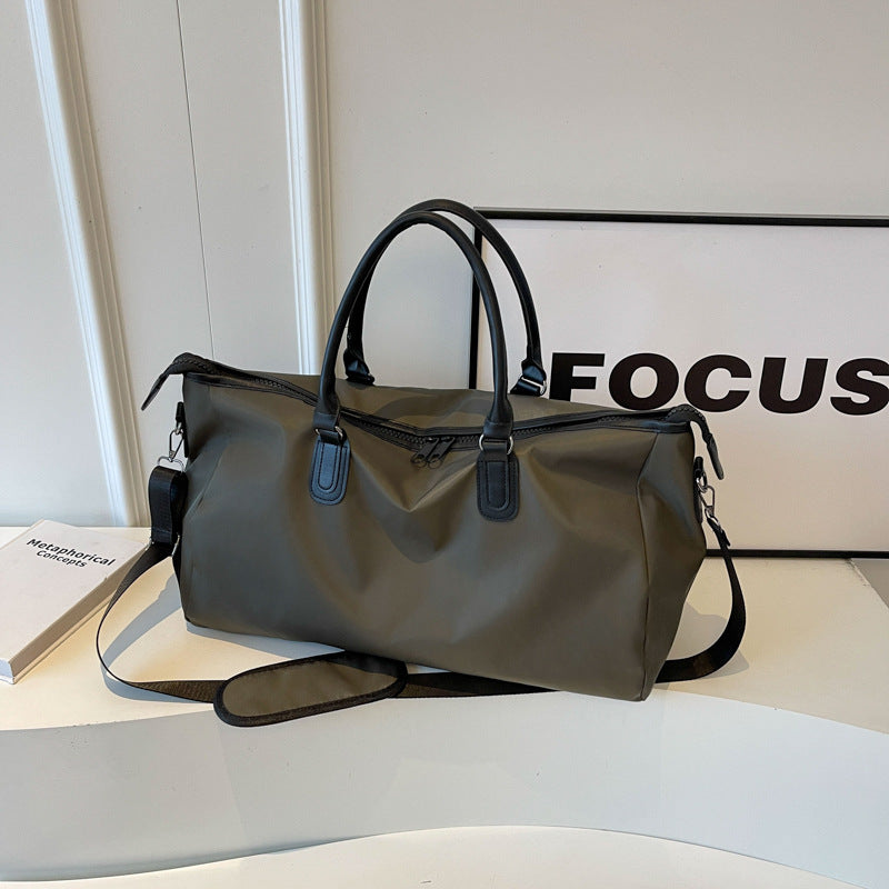 Elegantly Designed Travel Bag with Multifunctional Interior Compartments Bowlift
