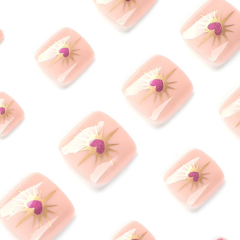 Artistic toenail art with heart and flower design Bowlift