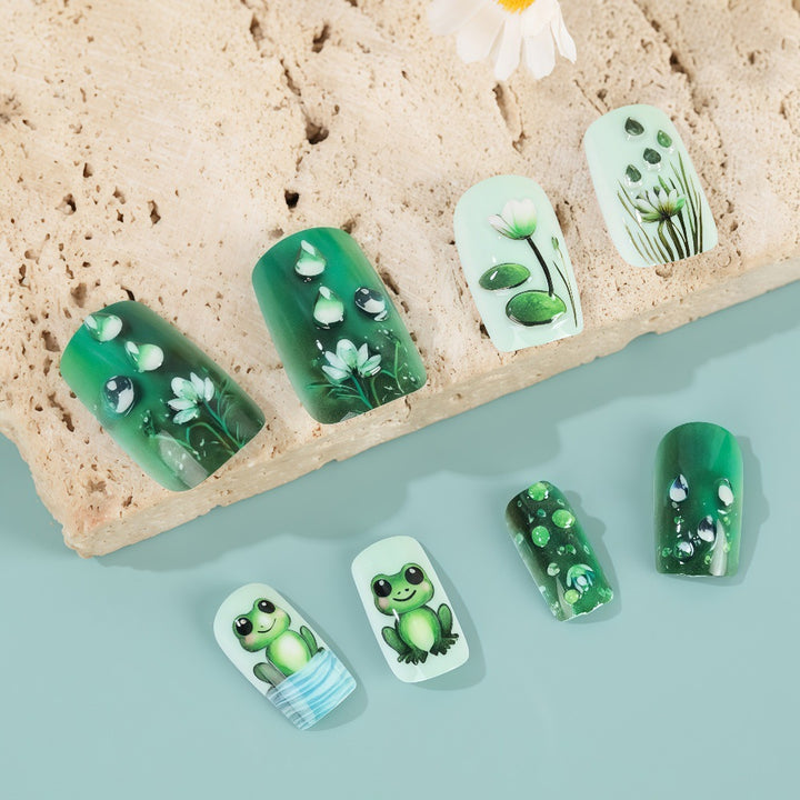 Creative art nails with frogs and plant details Bowlift