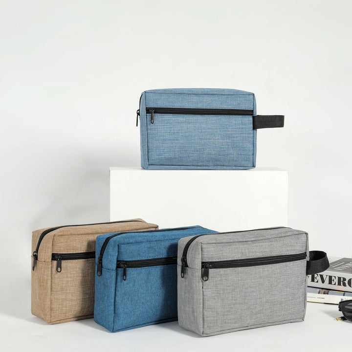Cosmetic bag with multiple compartments and secure zipper Bowlift