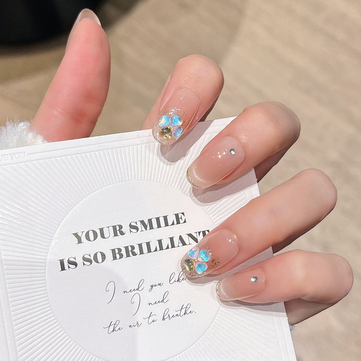 Elegant Nail Art Extensions with Pearl Accents Bowlift