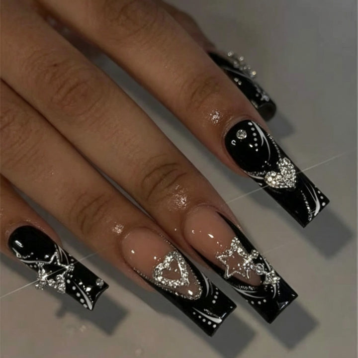 Artificial nails with elegant glitter accents and heart motifs Bowlift